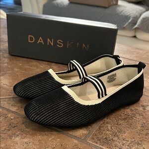 Danskin black and cream soft flats with elastic strap size 8 1/2.